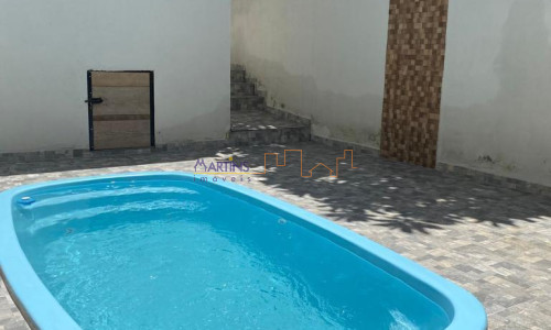 Casa térrea com piscina e vaga autos 125mts²